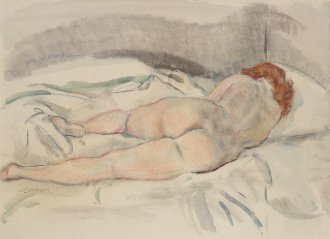 Lying nude on a bed, circa 1930
